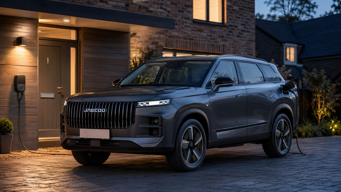 Grey Jaecoo J7 SHS-P charging overnight outside a modern UK home